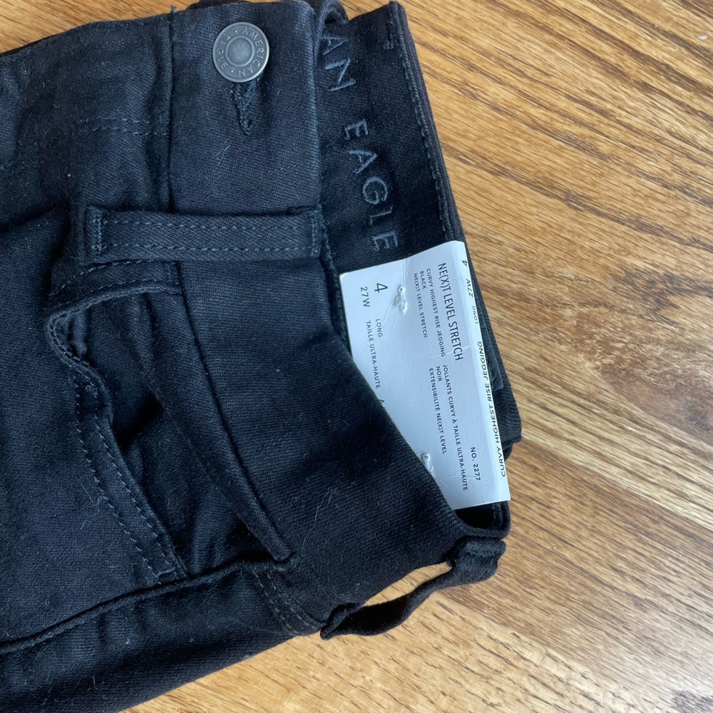 BRAND NEW NEXT LEVEL STRETCH CURVY HIGH RISE BLACK JEGGINGS FROM AMERICAN EAGLE